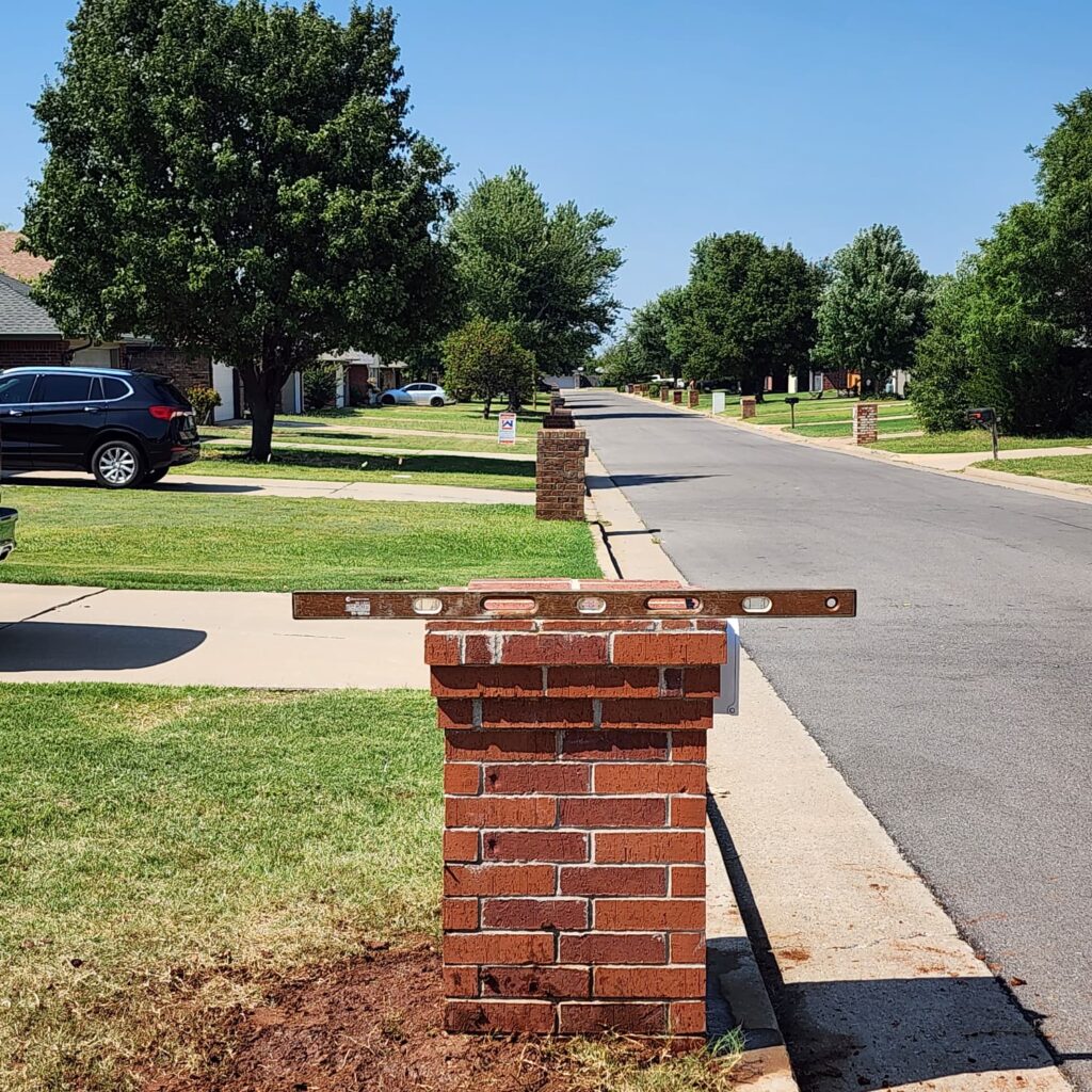Finished brick mailbox repair example after leveling and rebuild work