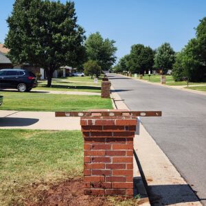 Finished brick mailbox repair example after leveling and rebuild work
